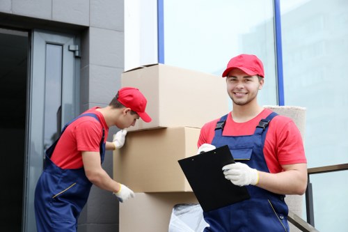 People using self storage in Surrey for moving and decluttering