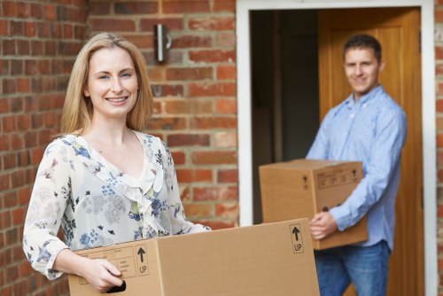Customer moving boxes safely in a storage facility
