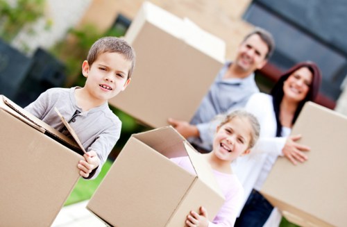 Careful loading of boxes and furniture for a small move in Surrey