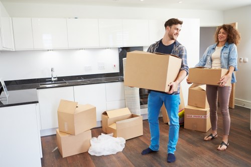Local removals team handling a Surrey home move with careful loading